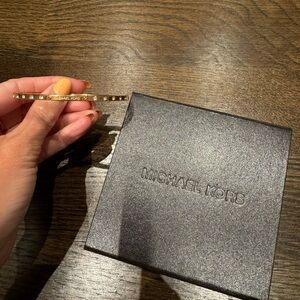 Michael Kors Gold hardware bracelet with silver gem details